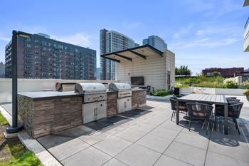 Outdoor grilling space at the elle apartments in chicago, il 60605